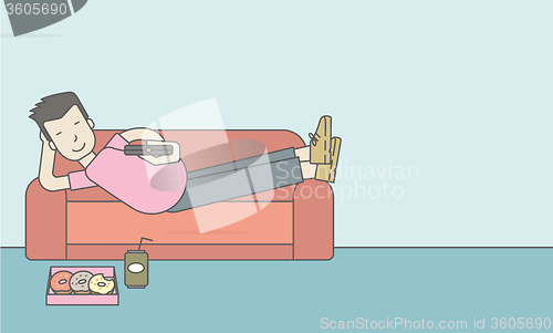 Image of Man lying on sofa.