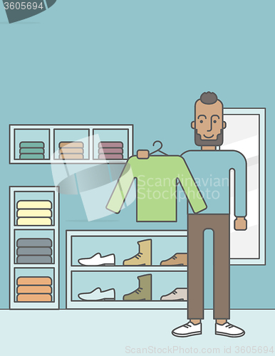 Image of Man in clothing store.