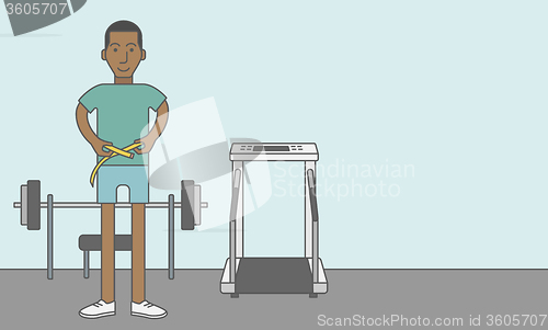 Image of Man measuring waist.