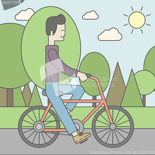 Image of Asian man riding bicycle in park.