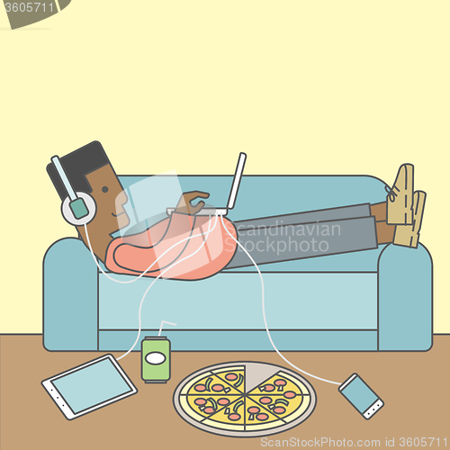 Image of Man lying on sofa.