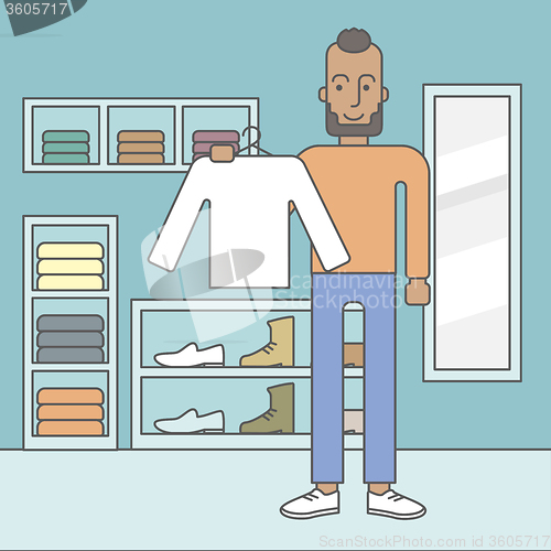 Image of Man in clothing store.