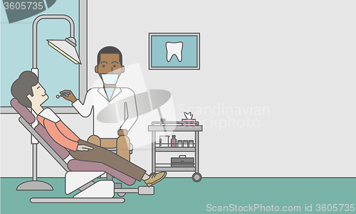 Image of Patient and dentist.