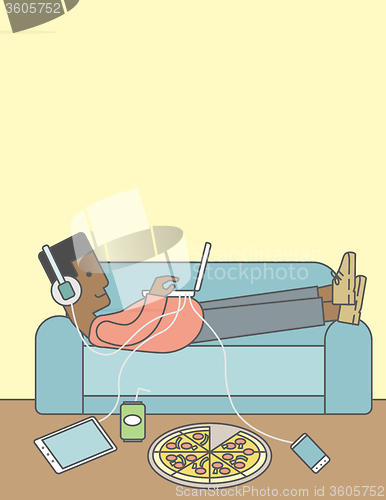 Image of Man lying on sofa.