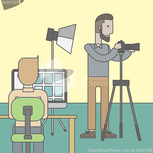 Image of Photographers in studio.
