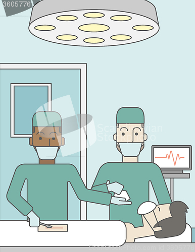 Image of Two surgeons working