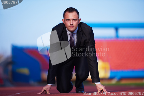 Image of business man ready to sprint