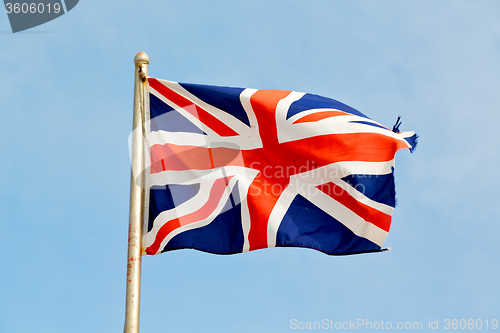 Image of waving flag in the blue 