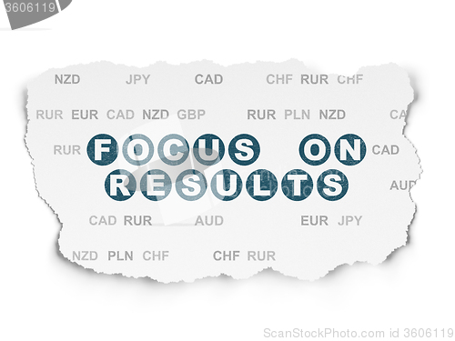 Image of Business concept: Focus on RESULTS on Torn Paper background