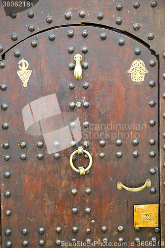 Image of historical in  antique building door morocco  and metal rusty