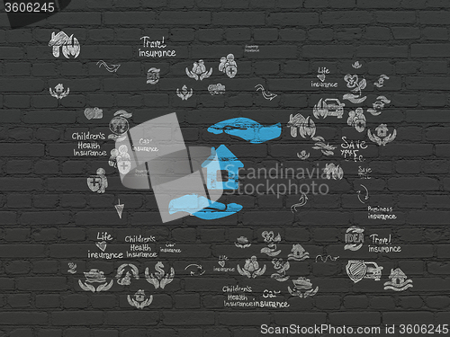 Image of Insurance concept: House And Palm on wall background