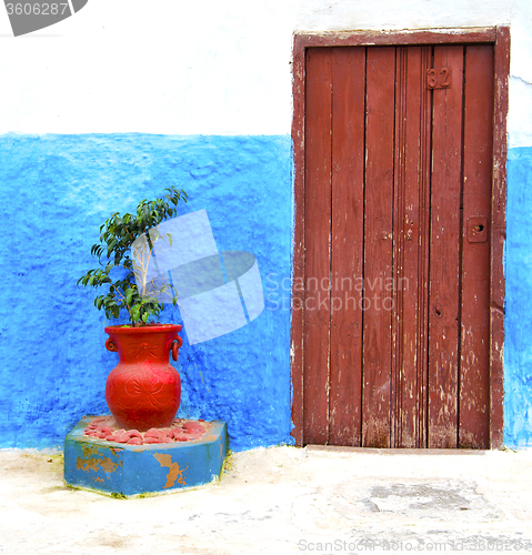 Image of historical blue  in  antique building door morocco      style af