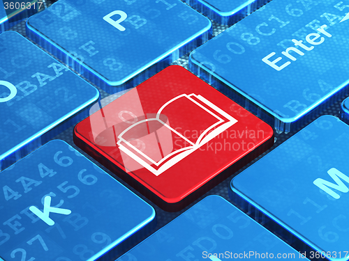 Image of Learning concept: Book on computer keyboard background