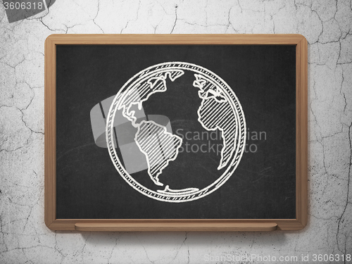 Image of Learning concept: Globe on chalkboard background