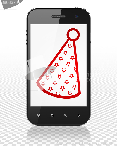 Image of Holiday concept: Smartphone with Party Hat on display