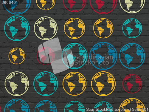 Image of Science concept: Globe icons on wall background