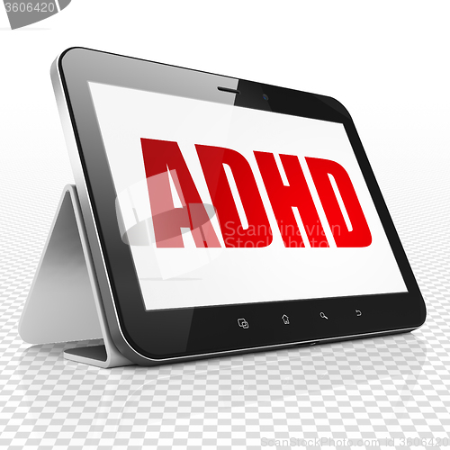 Image of Healthcare concept: Tablet Computer with ADHD on display