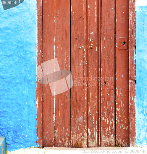 Image of historical blue  in  antique building door morocco      style af