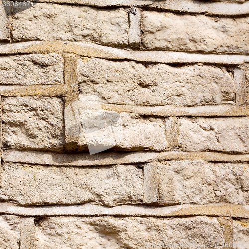 Image of in london abstract    texture of a ancien wall and ruined brick