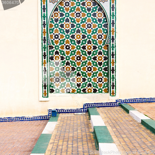 Image of blue window in morocco africa old construction and brown wall  c