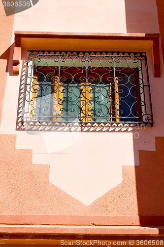 Image of   window in morocco  old construction and brown wall  