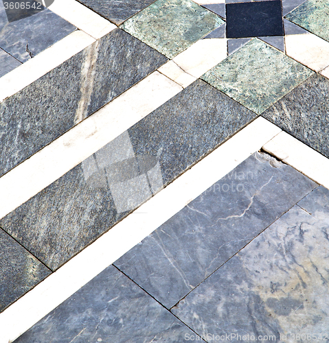 Image of busto arsizio  street  abstract   pavement of a curch ymarble