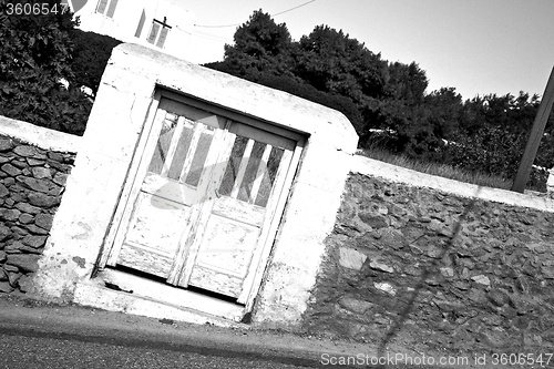 Image of blue door in  village  greece europe and    white wall