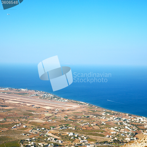 Image of in cyclades greece santorini europe the sky sea and village from