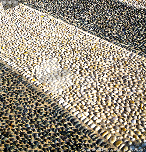 Image of in   castano primo  street  of a curch and marble