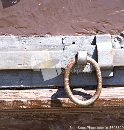 Image of crugnola abstract   rusty brass brown knocker in  