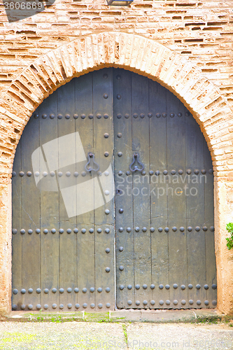 Image of historical in  antique  door morocco s  wood and metal rusty
