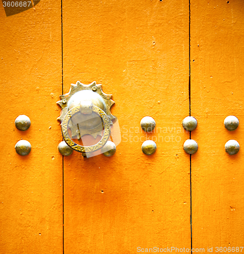 Image of rusty  brown    morocco in africa the old wood  facade home and 