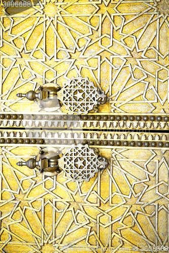 Image of metal rusty  brown    morocco in   wood  gold star