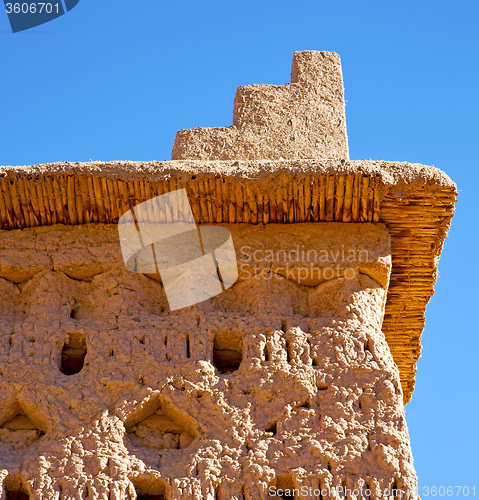 Image of brown old  construction in  africa morocco and  clouds  near the