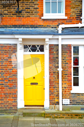 Image of notting   hill  area  in  england old   yellow  wall  