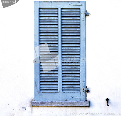 Image of grey window  viladosia palaces  in the concrete  brick  