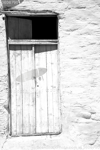 Image of blue door in antique village santorini greece europe and white w