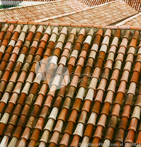 Image of minaret old moroccan  tile roof in the old city 