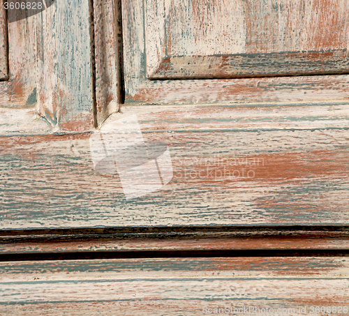 Image of greece home texture of a brown antique wooden old door in santor