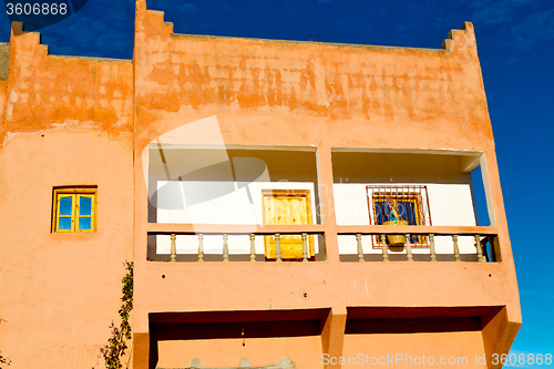 Image of blue   in morocco africa construction and brown wall   