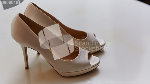 Image of White wedding shoes for women.