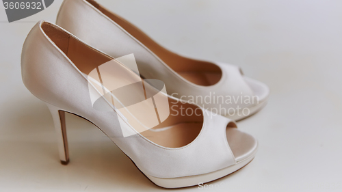 Image of White wedding shoes for women.