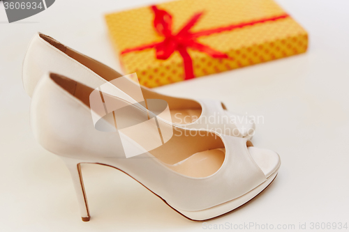 Image of White wedding shoes for women.