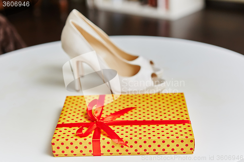 Image of White wedding shoes for women.