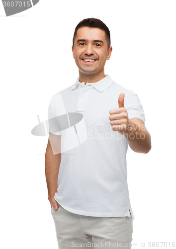 Image of smiling man showing thumbs up