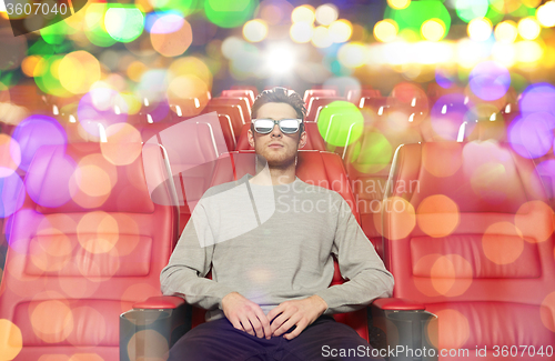 Image of young man watching movie in 3d theater