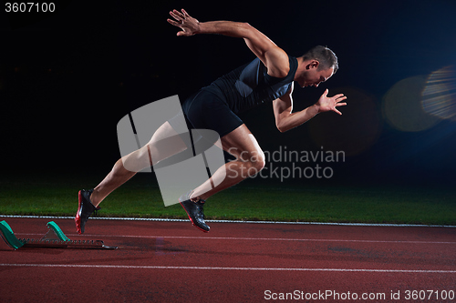 Image of Sprinter leaving starting blocks