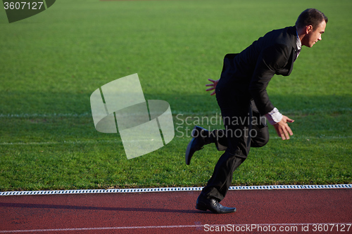 Image of business man ready to sprint