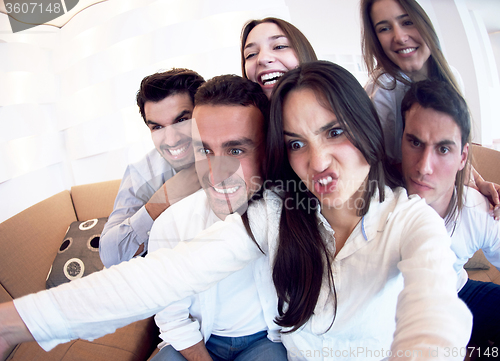 Image of group of friends taking selfie