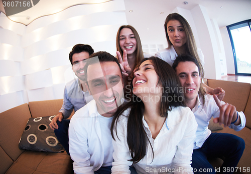 Image of group of friends taking selfie